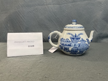 A Chinese blue and white teapot and cover with antiquities, Jiajing mark, Kangxi