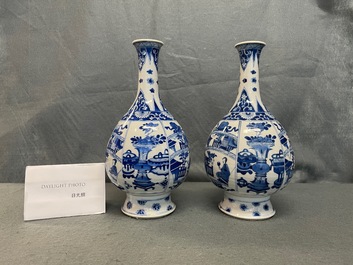 A pair of Chinese blue and white bottle vases, Kangxi