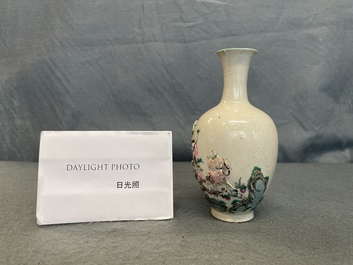 A Chinese famille rose relief-molded 'immortals' vase, Qianlong mark, 19th C.