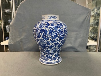 A Chinese blue and white 'lotus scroll' vase, 19th C.