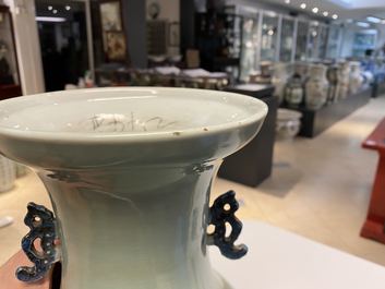 Deux vases en porcelaine de Chine en bleu et blanc sur fond c&eacute;ladon, 19&egrave;me