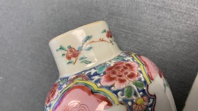 A Chinese famille rose garniture of five vases with antiquities, Qianlong