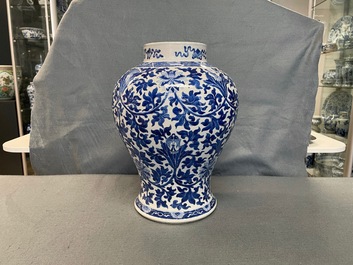 A Chinese blue and white 'lotus scroll' vase, 19th C.