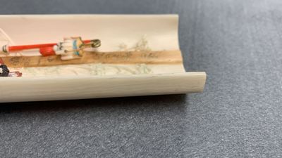 A pair of Chinese polychrome carved wrist rests in presentation box, Republic