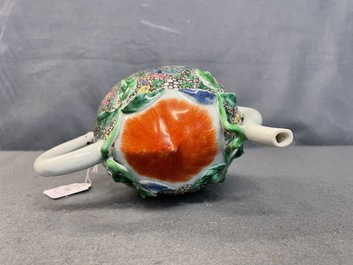 A Chinese famille rose peach-shaped 'cadogan' teapot with applied floral design, Qianlong