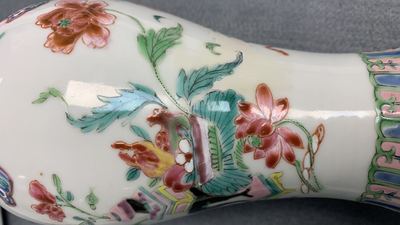 A Chinese famille rose garniture of five vases with antiquities, Qianlong