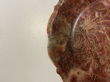 A pair of Chinese Shoushan soapstone gilt-decorated engraved cups and saucers, Kangxi