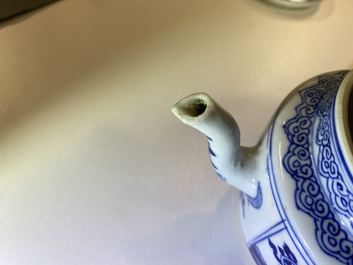 A pair of Chinese blue and white 'antiquities' teapots, Kangxi