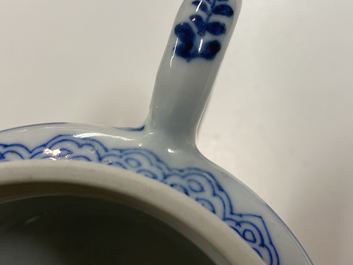 A pair of Chinese blue and white 'antiquities' teapots, Kangxi