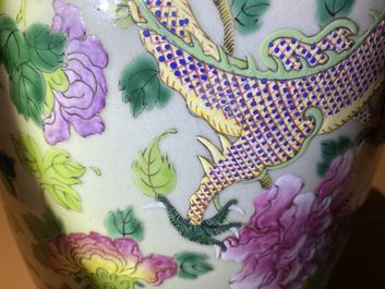 A pair of Chinese famille rose celadon-ground 'dragon' vases, 19th C.