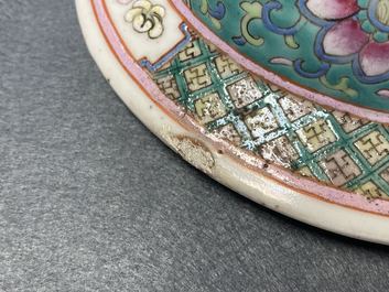 A pair of Chinese famille rose vases and covers, 19th C.