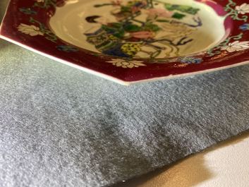A pair of Chinese octagonal famille rose 'ruby border' plates, Yongzheng