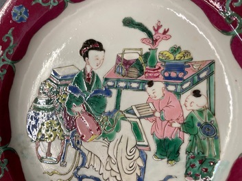 A pair of Chinese octagonal famille rose 'ruby border' plates, Yongzheng