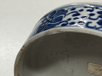 A pair of Chinese blue and white four-tier stacking boxes, a seal paste box and four saucers, 19th C.