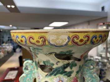A pair of Chinese famille rose celadon-ground 'dragon' vases, 19th C.