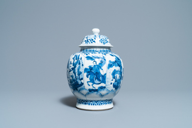 A Chinese blue and white 'horseriders' vase and cover, Kangxi