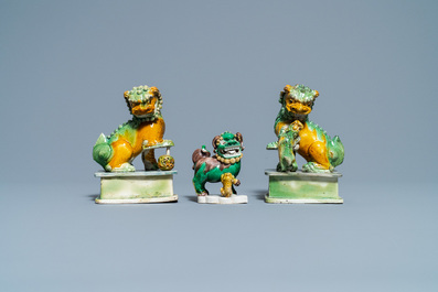 Three Chinese sancai-glazed models of Buddhist lions, Kangxi