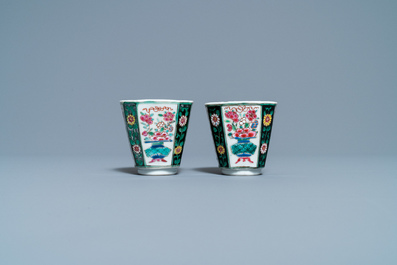 A pair of Chinese octagonal famille rose cups and saucers, Qianlong