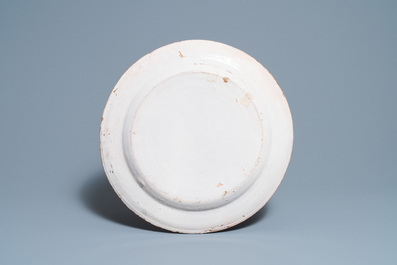 A large polychrome Spanish faience 'portrait' dish, 19th C.
