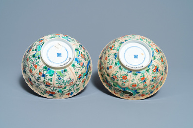 A pair of Chinese famille verte caf&eacute;-au-lait-ground lotus-molded bowls, Kangxi