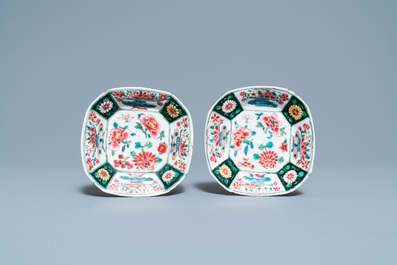 A pair of Chinese octagonal famille rose cups and saucers, Qianlong
