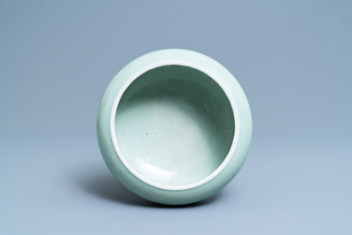 A Chinese celadon-glazed tripod censer with incised underglaze design, Kangxi