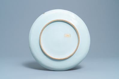 A Chinese famille verte powder blue-ground dish, 19th C.