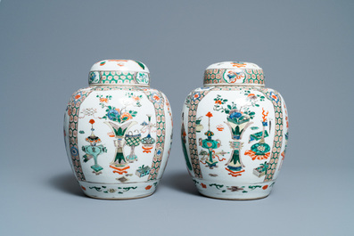 A pair of Chinese famille verte jars and covers, Kangxi