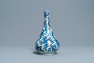 A Chinese blue and white 'sea dragons' bottle vase, Wanli