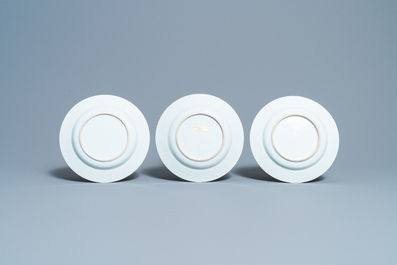 Eighteen Chinese famille rose plates with floral sprigs on scrolls, Yongzheng