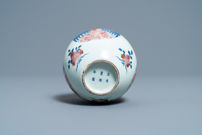 A Chinese blue, white and copper-red 'phoenixes' water pot, Kangxi mark, 19th C.