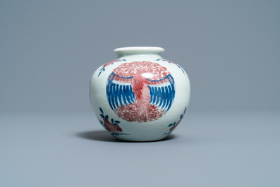 A Chinese blue, white and copper-red 'phoenixes' water pot, Kangxi mark, 19th C.