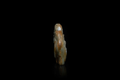 A Chinese celadon and russet jade mountain landscape with deer and cranes, Qing