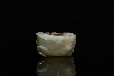 A Chinese mottled celadon and brown jade peach-form brush washer, Qing