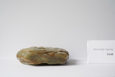 A Chinese celadon and russet jade mountain landscape with deer and cranes, Qing