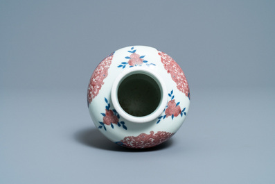 A Chinese blue, white and copper-red 'phoenixes' water pot, Kangxi mark, 19th C.