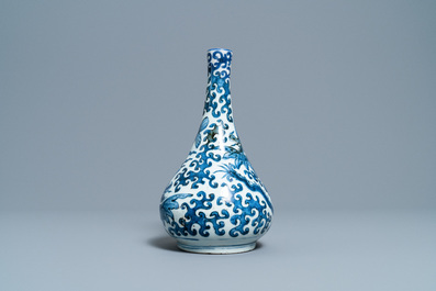 A Chinese blue and white 'sea dragons' bottle vase, Wanli