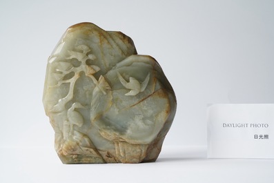 A Chinese celadon and russet jade mountain landscape with deer and cranes, Qing