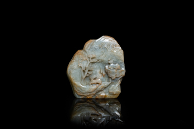 A Chinese celadon and russet jade mountain landscape with deer and cranes, Qing