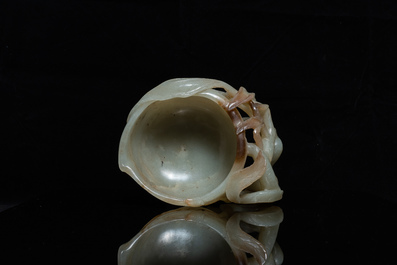 A Chinese mottled celadon and brown jade peach-form brush washer, Qing