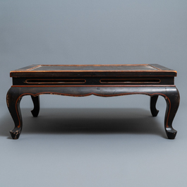 A Chinese black- and red-lacquered wooden 'dragon' table, 19th C.