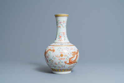 A Chinese famille rose 'dragon' bottle vase, Guangxu mark, 19/20th C.