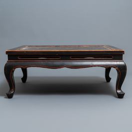 A Chinese black- and red-lacquered wooden 'dragon' table, 19th C.