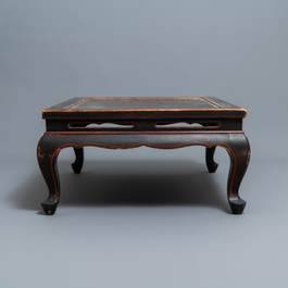 A Chinese black- and red-lacquered wooden 'dragon' table, 19th C.