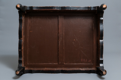 A Chinese black- and red-lacquered wooden 'dragon' table, 19th C.