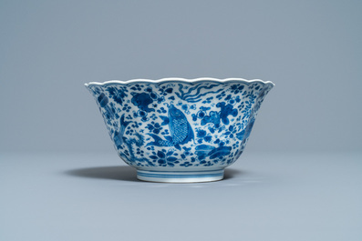 A Chinese blue and white lobed 'carps and crab' bowl, Kangxi