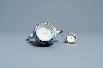 A Chinese blue and white silver-mounted ewer and cover, Transitional period