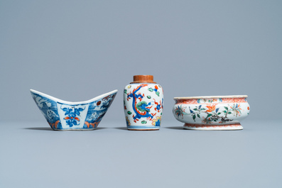 A Chinese doucai bowl, a famille verte spice box and a wucai tea caddy, Kangxi and later