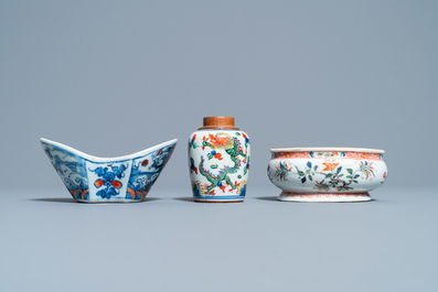 A Chinese doucai bowl, a famille verte spice box and a wucai tea caddy, Kangxi and later