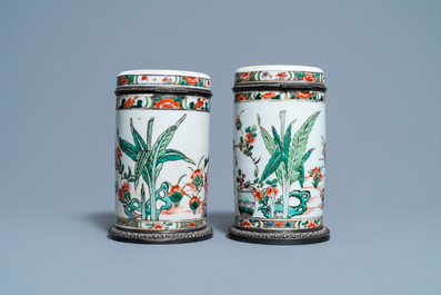 A pair of Chinese silver-mounted cylindrical famille verte covered jars, Kangxi